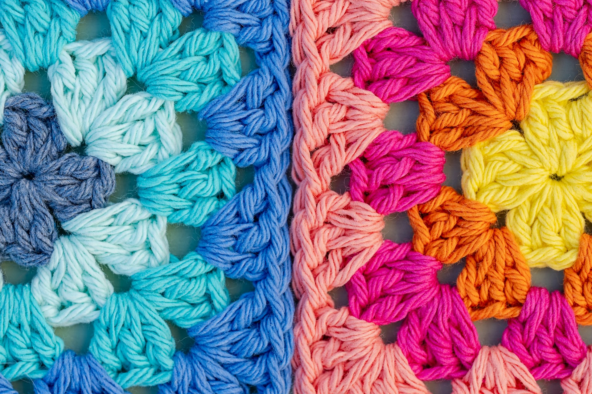 Colourful crochet granny squares in cool and warm tones