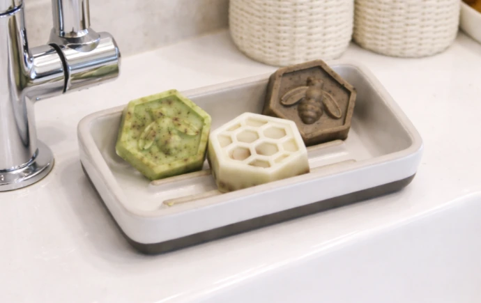 Set of 3 hexagonal bee styled soaps in green, white and brown