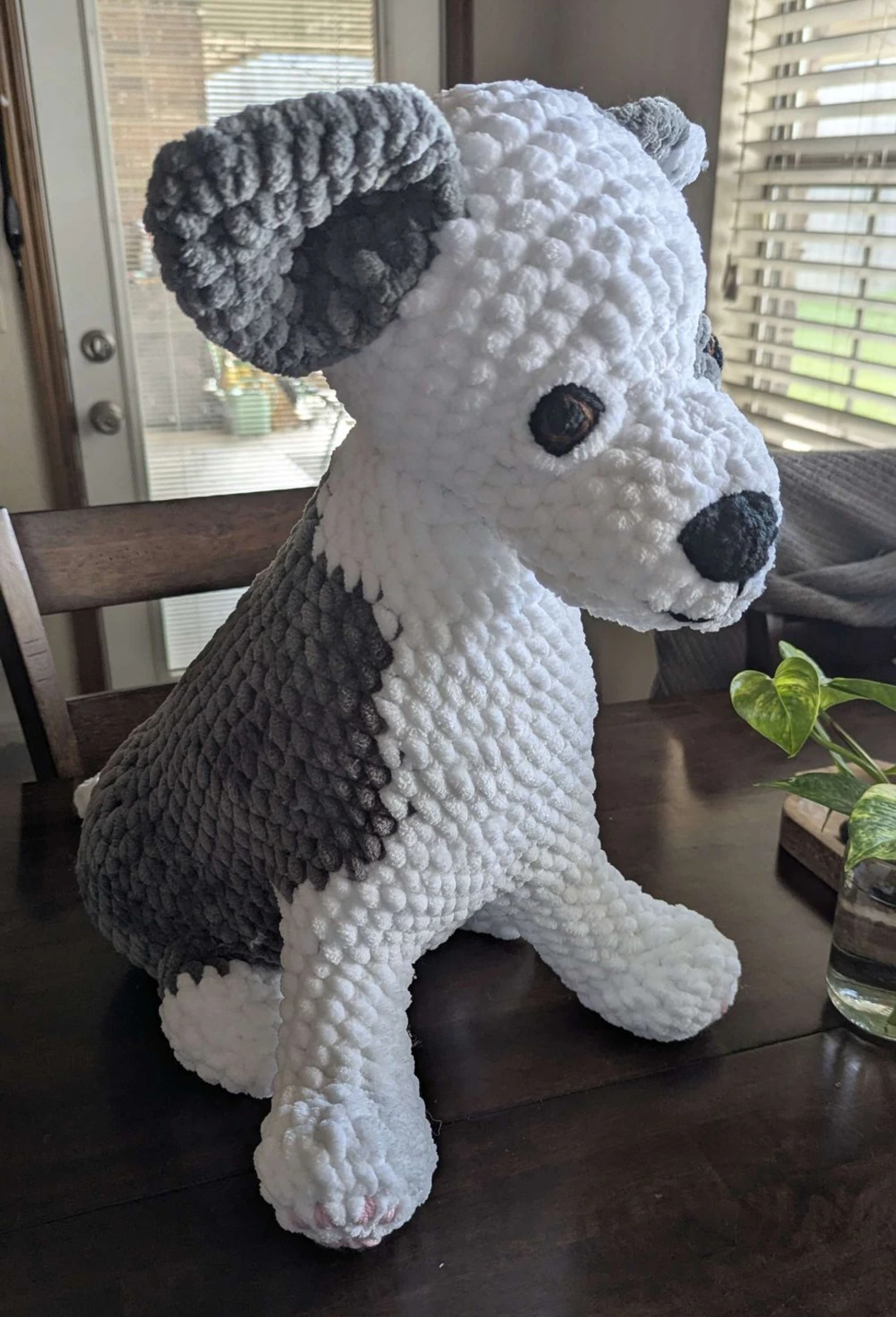 Crocheted grey and white dog