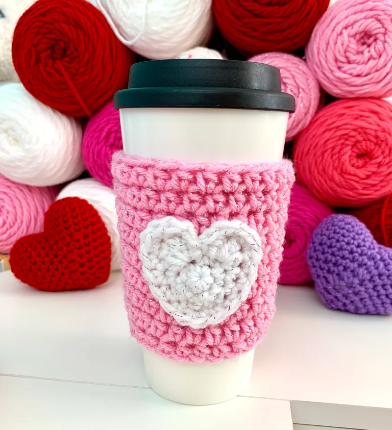 pink coffee cup cozy with white heart